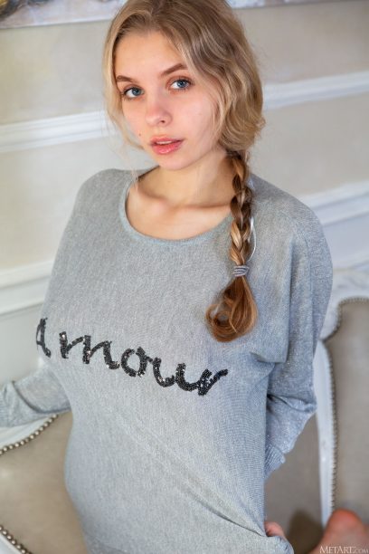 Mila Amour strips off sweatshirt to pose nude 02